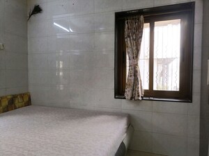Room in 1 BHK Apartment at Malad East – for Sale