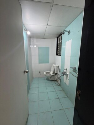 Bathroom in 3 BHK Apartment at Paranjape Schemes Saptagiri, Baner – for Rent
