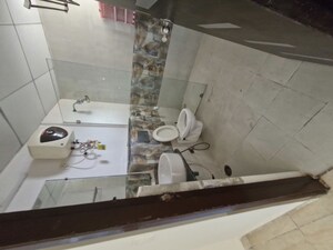 Bathroom in 3 BHK Apartment at Gaur Sportswood Arcade, Sector 79 – for Rent