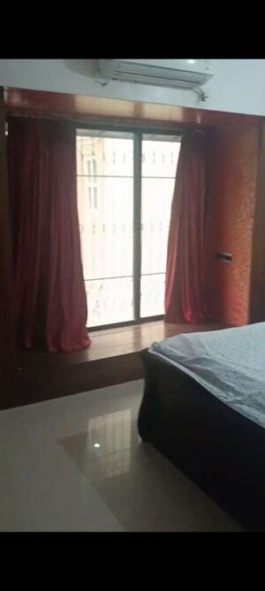 Bedroom in 2 BHK Apartment at K Raheja Palm Court, Malad West – for Rent