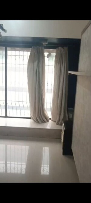 Building Lobby in 2 BHK Apartment at K Raheja Palm Court, Malad West – for Rent