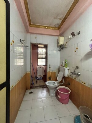 Bathroom in 2 BHK Apartment at Manyata CHS, Tilak Nagar – for Rent