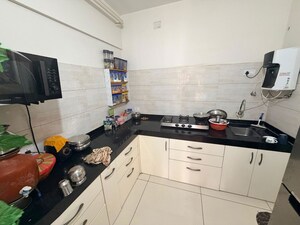 Kitchen in 2 BHK Apartment at Yashwin Orrizonte, Kharadi – for Rent