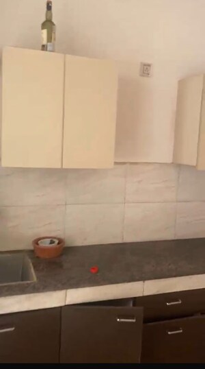 Kitchen in 1 BHK Apartment at Eureka Diya Green City, Raj Nagar Extension – for Sale