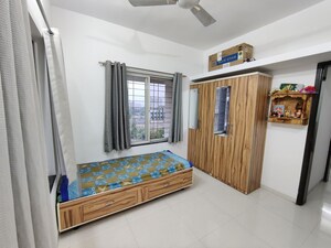 Bedroom in 2 BHK Apartment at Shraddha Twin Tower, Wakad – for Rent