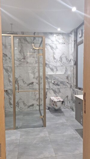 Bathroom in 5 BHK Builder Floor at Raj Nagar Extension – for Sale