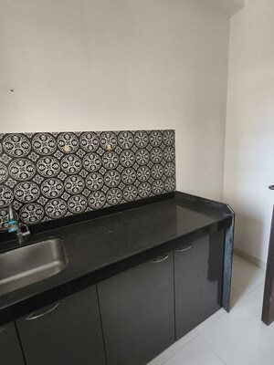 Kitchen in 1 BHK Apartment at Lodha Amara, Kolshet Road – for Sale