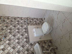 Bathroom in 4 BHK Builder Floor at Krishna Palace Faridabad, Sector 15a – for Rent