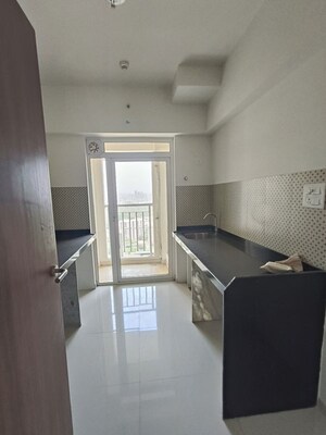 Kitchen in 2 BHK Apartment at Lodha Amara, Kolshet Road – for Sale