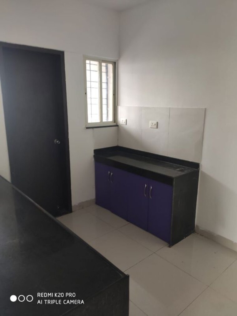 Kitchen, mantra-senses 2 Bedroom 1000 Sq.Ft. Apartment In Handewadi Pune 10373960