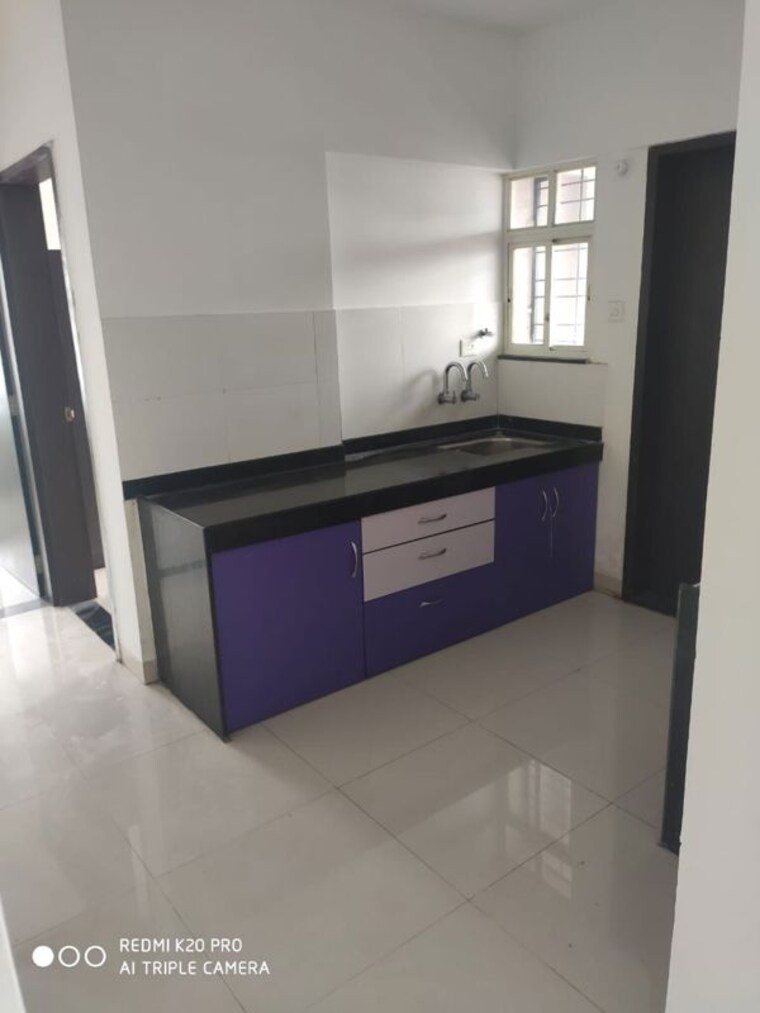Kitchen, mantra-senses 2 Bedroom 1000 Sq.Ft. Apartment In Handewadi Pune 10373960