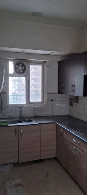 Kitchen in 1 BHK Apartment at Gaur City 5th Avenue, Sector 4 Greater Noida – for Rent