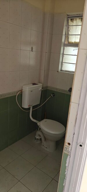 Bathroom in 2 BHK Apartment at Sainikwadi – for Rent