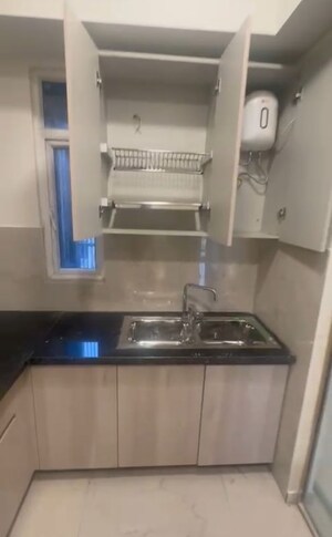 Kitchen in 2.5 BHK Builder Floor at Smart World Orchard, Sector 61 – for Rent