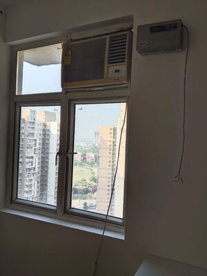 Room in 2 BHK Apartment at Mahagun My Woods, Sector 16c Greater Noida – for Rent
