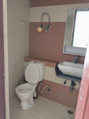 Bathroom in 2 BHK Apartment at Mahagun My Woods, Sector 16c Greater Noida – for Rent