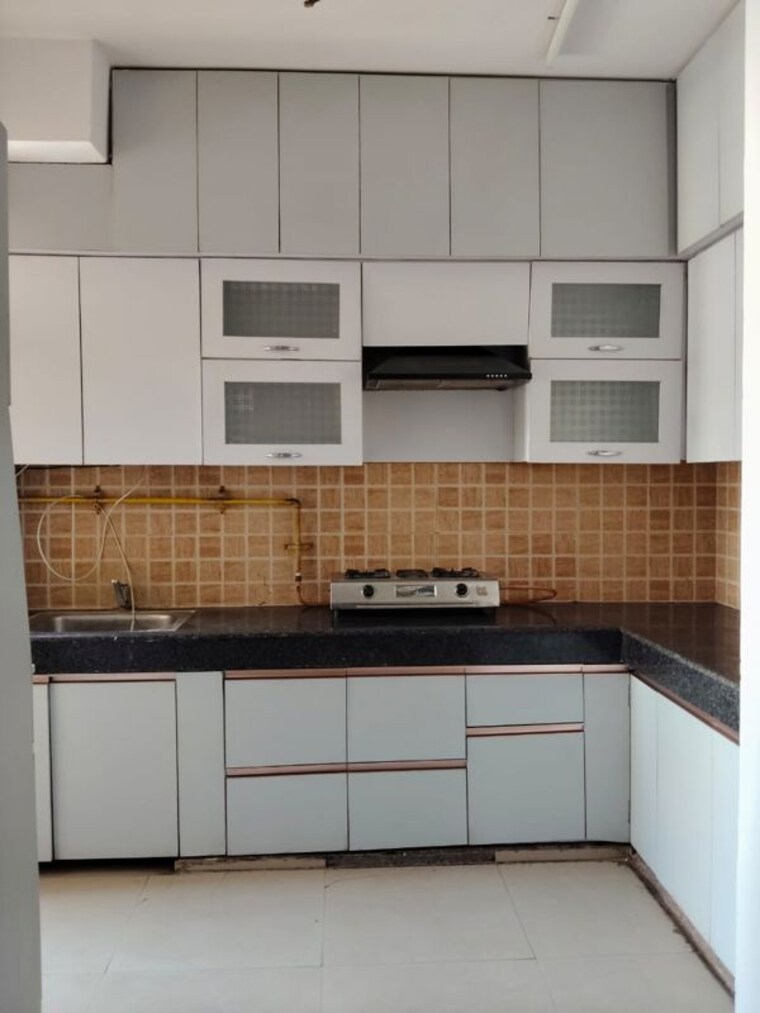 Kitchen, mahagun-my-woods 2 Bedroom 935 Sq.Ft. Apartment In Sector 16c Greater Noida Greater Noida 10373978