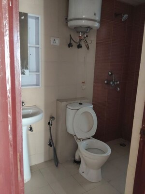 Bathroom in 2 BHK Apartment at Mahagun My Woods, Sector 16c Greater Noida – for Rent