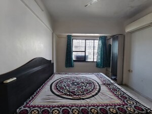 Bedroom in 2 BHK Apartment at Shah Arcade, Kharghar – for Rent
