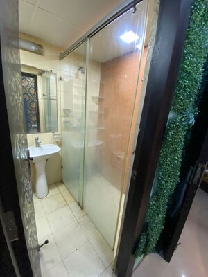 Bathroom in 5 BHK Apartment at Mahagun My Woods, Sector 16c Greater Noida – for Sale