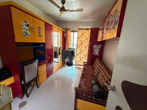 Bedroom in 2 BHK Apartment at Sai Nisarg CHS, Kharghar Sector 19 – for Rent