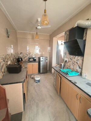 Kitchen in 4 BHK Apartment at Sushant Lok I – for Rent