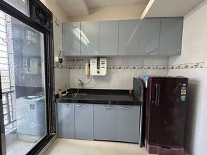 Kitchen in 2 BHK Apartment at Grow More Tower, Kharghar – for Rent