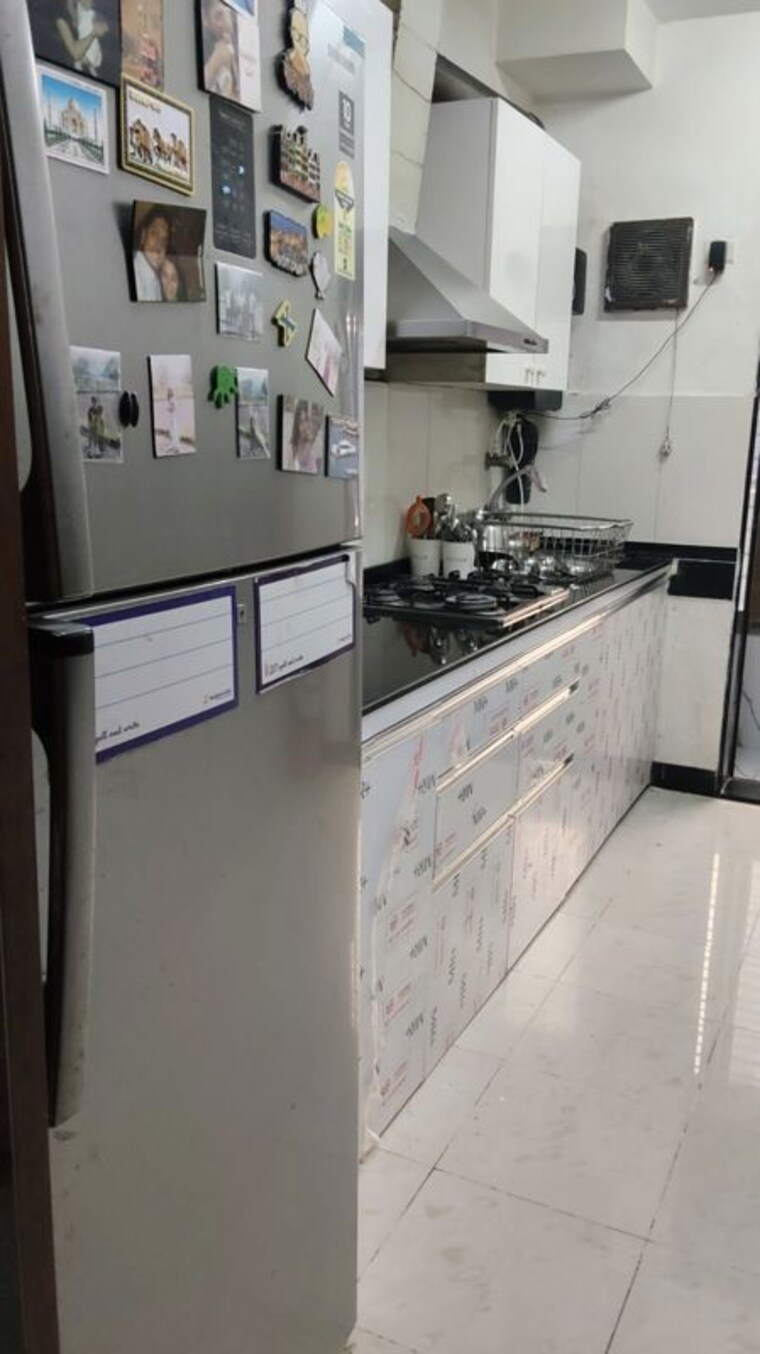 Kitchen, evershine-greens 3 Bedroom 1300 Sq.Ft. Apartment In Andheri West Mumbai 10374148