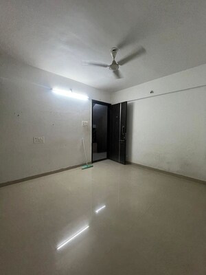 Living Room in 1 BHK Apartment at Dreams Camellia, Bavdhan – for Rent