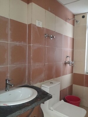 Bathroom in 2.5 BHK Apartment at Mahagun My Woods, Sector 16c Greater Noida – for Sale