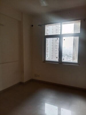 Room in 2.5 BHK Apartment at Mahagun My Woods, Sector 16c Greater Noida – for Sale