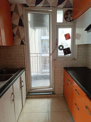 Kitchen in 3.5 BHK Apartment at Emaar Palm Hills, Sector 77 – for Rent