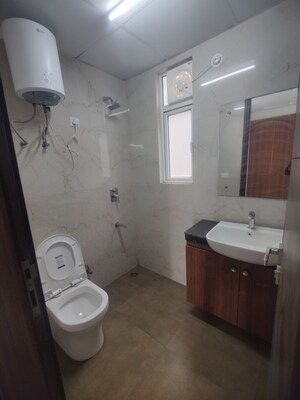 Bathroom in 3.5 BHK Builder Floor at Smart World Gems, Sector 89 – for Rent