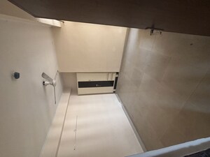 Staircase in 2 BHK Apartment at Supertech Cape Luxe, Sector 74 – for Sale