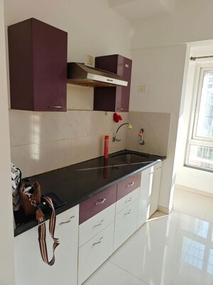 Kitchen in 1 BHK Apartment at Puranik Rumah Bali, Ghodbunder Road – for Rent
