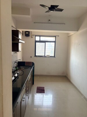Kitchen in 3 BHK Apartment at Puranik City, Kasarvadavali – for Rent