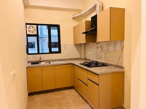 Kitchen in 3 BHK Apartment at Suncity Vatsal Valley, Gwal Pahari – for Rent