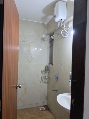 Bathroom in 1 BHK Apartment at Raunak Bliss B1, Ghodbunder Road – for Rent