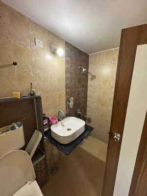 Bathroom in 3 BHK Apartment at Dev Aurum, Prahlad Nagar – for Sale