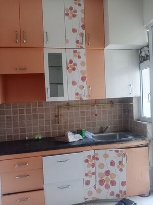 Kitchen in 2 BHK Apartment at Mahagun My Woods, Sector 16c Greater Noida – for Rent