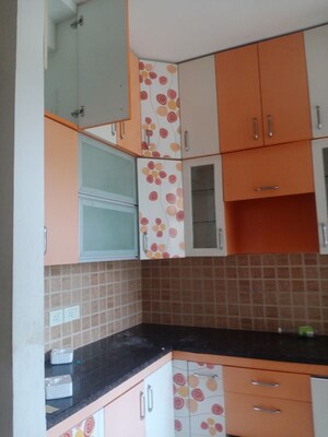 Kitchen in 2 BHK Apartment at Mahagun My Woods, Sector 16c Greater Noida – for Rent