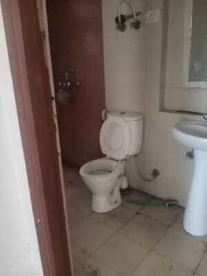 Bathroom in 2 BHK Apartment at Mahagun My Woods, Sector 16c Greater Noida – for Rent