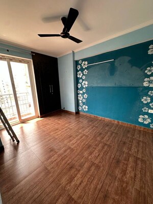 Bedroom in 3 BHK Apartment at Mahagun My Woods, Sector 16c Greater Noida – for Rent