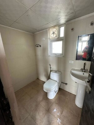 Bathroom in 3 BHK Apartment at Mahagun My Woods, Sector 16c Greater Noida – for Rent
