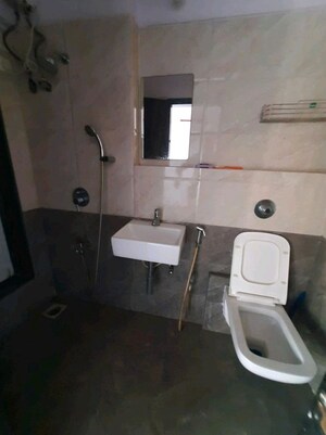 Bathroom in 1 BHK Apartment at Sethia Kalpavruksh Heights, Kandivali West – for Rent