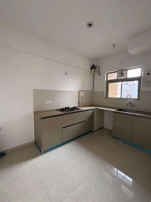 Kitchen in 2 BHK Apartment at Hiranandani Delanna, Ghodbunder Road – for Sale