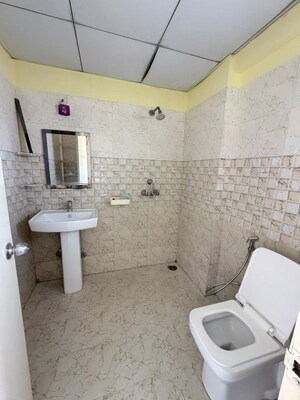 Bathroom in 4 BHK Apartment at Mahagun My Woods, Sector 16c Greater Noida – for Sale
