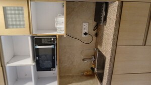 Bathroom in Studio Apartment at Gaur City Mall, Sector 4 Greater Noida – for Sale