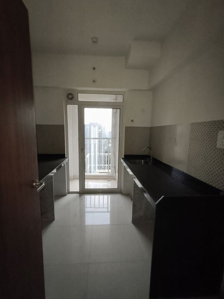 Kitchen, lodha-amara 2 Bedroom 735 Sq.Ft. Apartment In Kolshet Road Thane 10374474