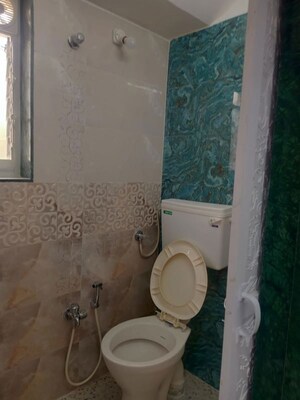 Bathroom in 2 BHK Apartment at Versova – for Rent